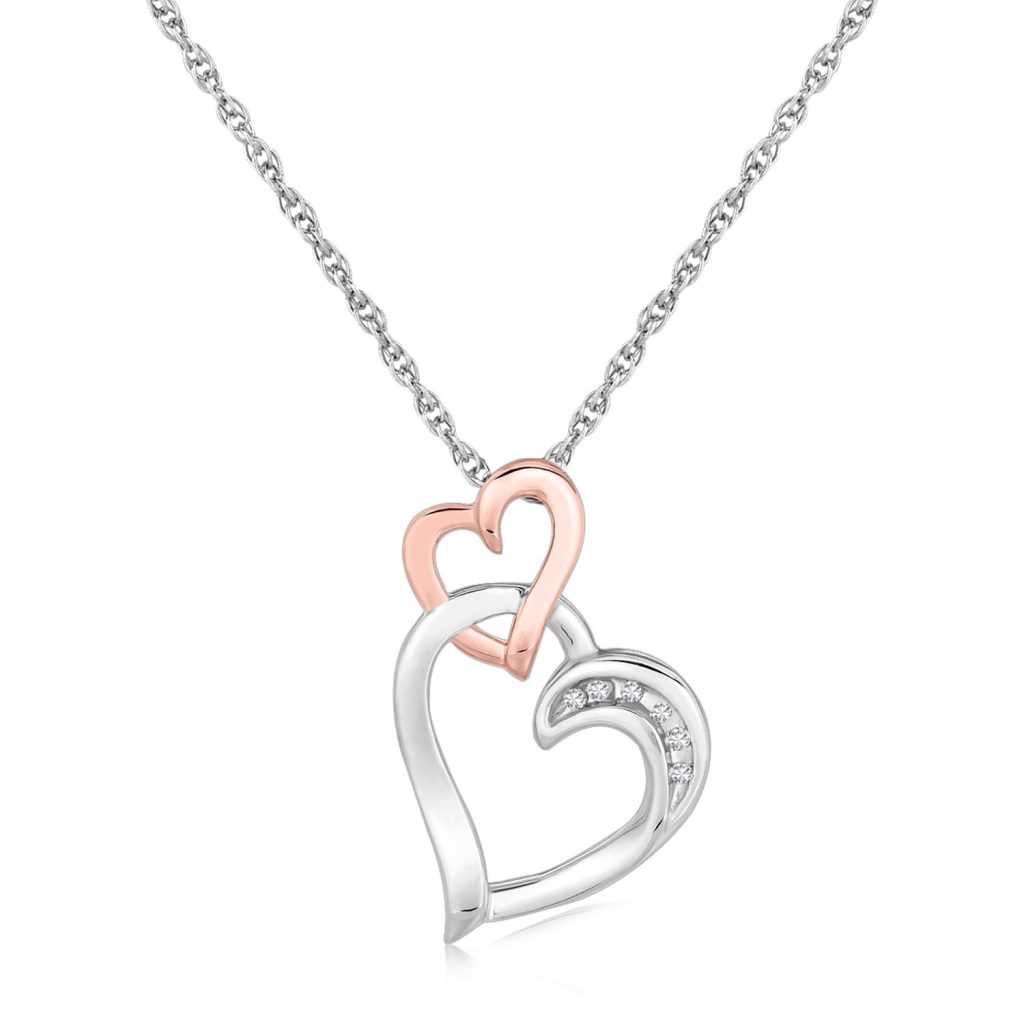 Sterling silver Cascading Dual Heart Diamond Accented Pendant.