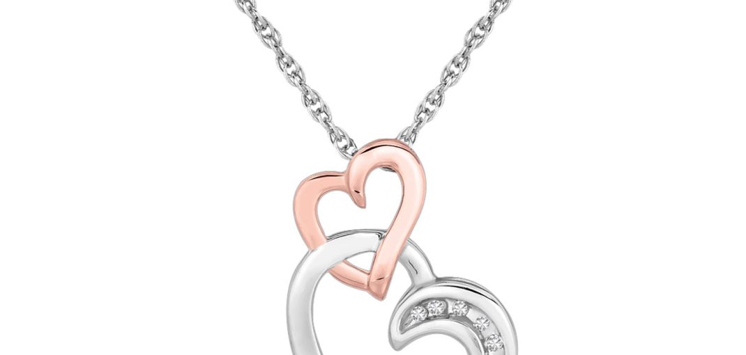 Sterling Silver Cascading Dual Heart Diamond Accented Pendant.